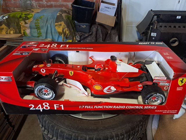 Vintage ferrari formule 1 met afstandsbediening in doos origineel schaal 1 op 7 - afbeelding 1 van  7