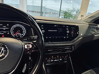 Volkwsagen polo 1.6 tdi sportline - afbeelding 32 van  65