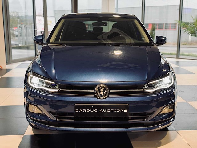 Volkwsagen polo 1.6 tdi sportline - afbeelding 33 van  65