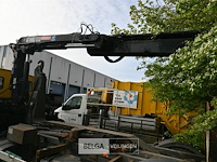 Volvo vrachtwagen met containersysteem en laadkraan hiab - afbeelding 14 van  25