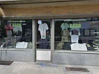 Wegens faillissement b.y. - partij schoenen en kledij te antwerpen