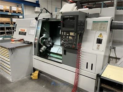 Wegens faillissement tupperware belgium nv - cnc, zinkvonkmachine, grote partij elektro en machine o...