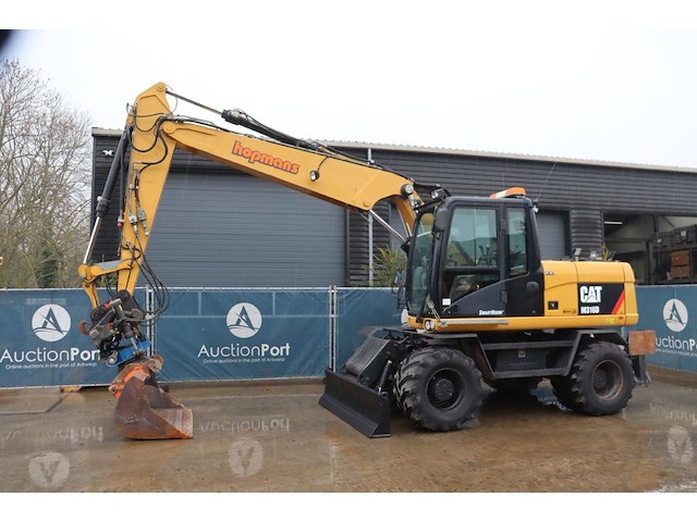 Wielgraafmachine caterpillar m316d diesel 2011 draaikantelstuk - afbeelding 1 van  1