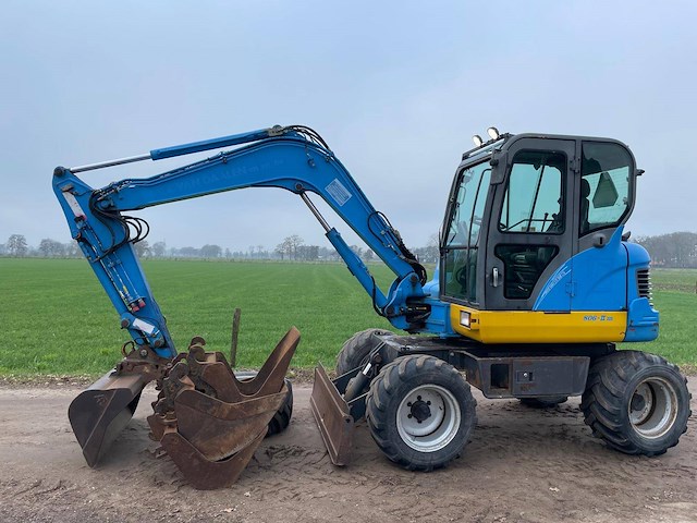 Wielgraafmachine doosan dx55 wd diesel 2010 - afbeelding 1 van  1