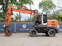 Wielgraafmachine hitachi zaxis zx140w-3 diesel 90kw 2009