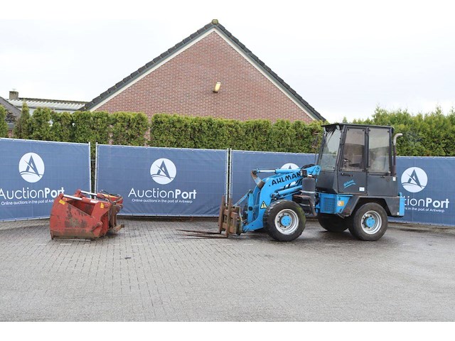 Wiellader ahlmann al 7 diesel 1994 met kuilhapper en palletvorken - afbeelding 1 van  1