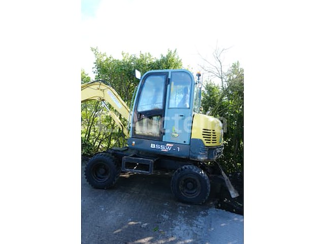 Yanmar b55w-1 wielgraafmachine met cabine (vin:1655) - afbeelding 1 van  18