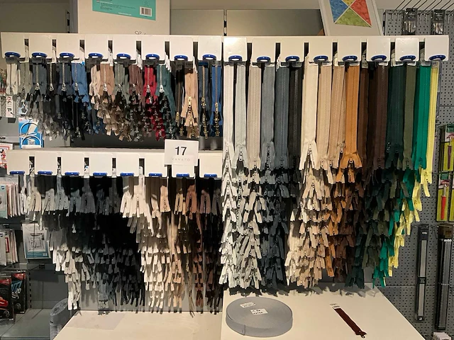 Ykk ritsen en ophangsysteem (circa 1000 stuks) - afbeelding 1 van  17